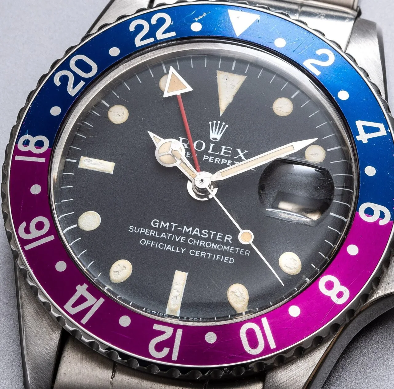 Ref. 1675「Pink Panther」· 第一代量产型，铝制双色圈