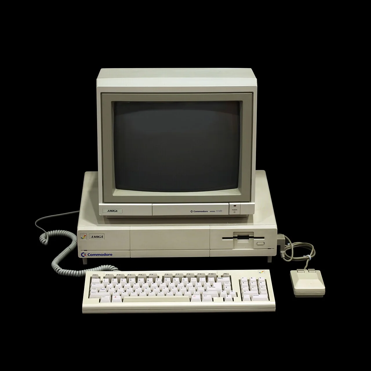 Musée Bolo 馆藏的 Amiga 1000 侧面,可见前部抬起的机身与塞在下面的键盘(「keyboard garage」)。图:Rama & Musée Bolo / Wikimedia Commons,CC BY-SA 2.0 FR。