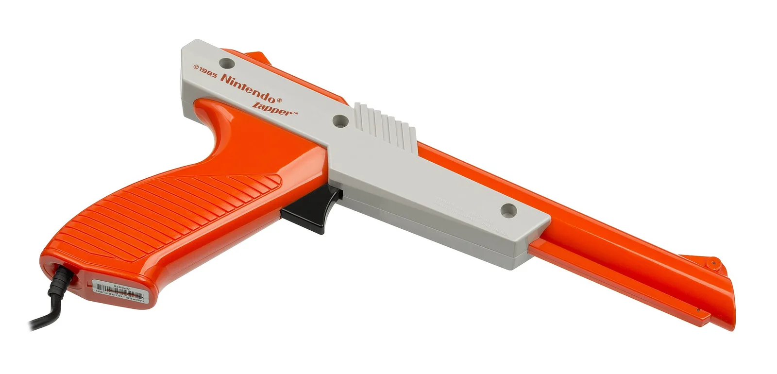 橙色版 NES Zapper 光枪。Evan-Amos 摄(Wikimedia Commons),公有领域。 · 图像文件署名:Evan-Amos;Public domain;网页缩放,原始文件保留。